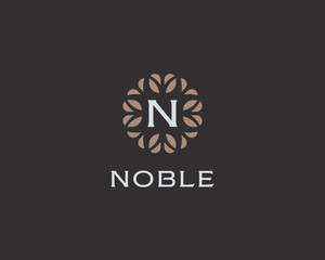 Premium monogram letter N initials logo. Universal symbol icon vector design. Luxury abc leaf logotype.