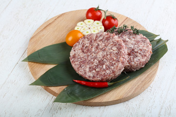 Raw burger cutlet