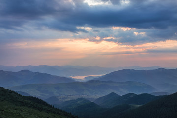 Naklejka na ściany i meble Majestic sunset in the mountains landscape. Carpathian mountins, Ukraine.