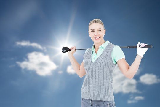 Composite image of pretty blonde posing with golf equipment