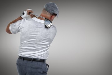 Composite image of golf player taking a shot
