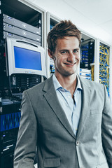 Fototapeta premium IT Professional in front of computer servers