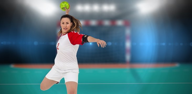 Sportswoman throwing a ball 