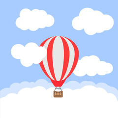 Fototapeta premium Hot air balloon in the cloudy sky. Vector illustration