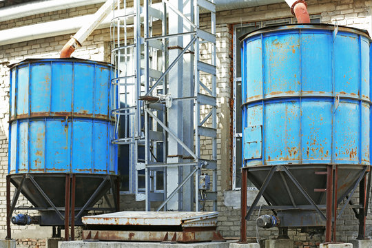 Old big blue tanks on the factory