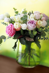 Obraz na płótnie Canvas Vase with fresh roses, closeup