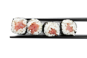 Sushi roll with chopsticks, isolated on white