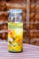 Homemade lemon vodka in a glass jar. Limoncello