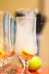 Smoke the cocktail glass.