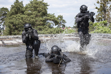 Spec ops police officers SWAT in the water