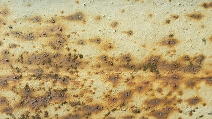 Iron corrosion paint yellow brown even layer with scratches and