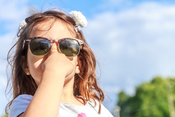 outdoor portrait of young child girl on natural background