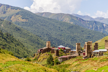 ancient stone tower in Georgia, mountain background