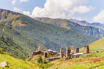 ancient stone tower in Georgia, mountain background