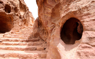 Tombs in Little Petra - Nabataeans capital city (Al Khazneh) , Jordan. Made by digging a holes in...