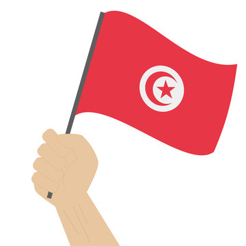 recommend clip art: Hand holding and raising the national flag of Tunisia