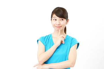 スポーツウェアの女性 考える