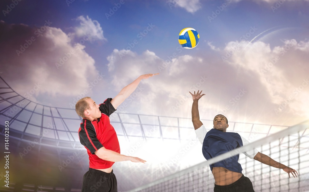 Canvas Prints Composite image of sportsmen are playing volleyball 