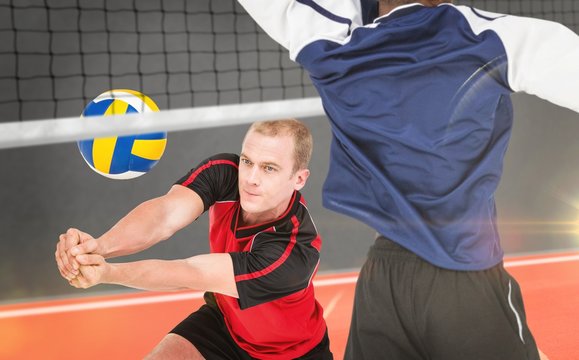 Composite image of sportsmen are playing volleyball 