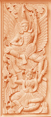  Traditional Old wood carving on the wall of Temple in Thailand,