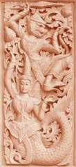  Traditional Old wood carving on the wall of Temple in Thailand,