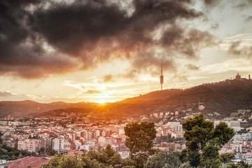 Panoramic view of Barcelona from Park Guell in a beautifull winter day at sunset, Spain