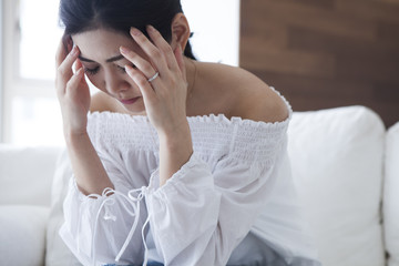 Young women are troubled with headache