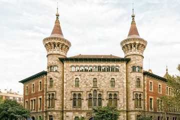 Fototapeta premium Brick house with two towers in Barcelona