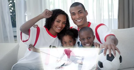 Foto op Plexiglas Composite image of family celebrating a football goal © vectorfusionart