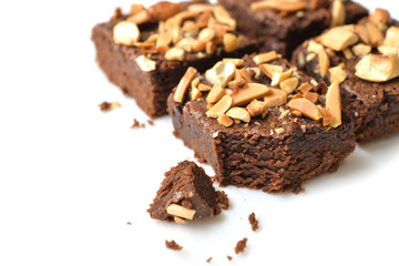 Many pieces of brownie on white background - isolated