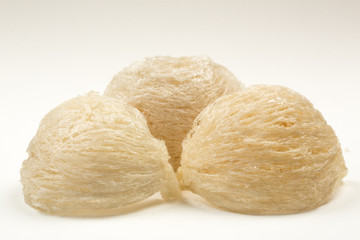 Fresh edible bird's nest on white paper