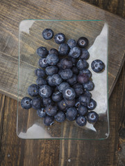 Ripe blueberries, on wood