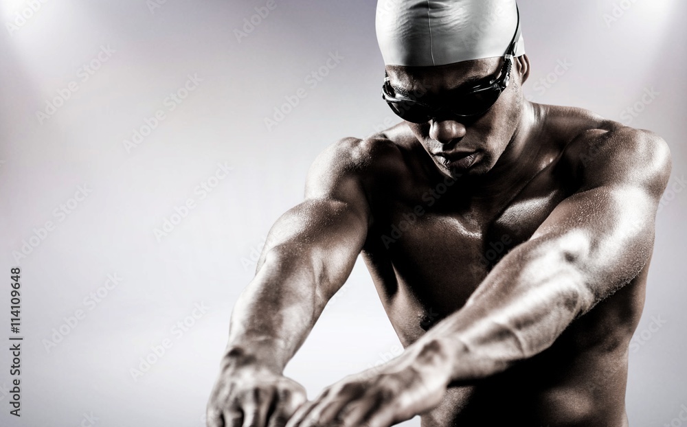 Canvas Prints Composite image of swimmer ready to dive