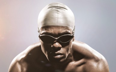 Composite image of swimmer ready to dive