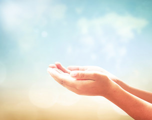 World environment day concept: Prayer open two empty hands with palms up for praying over world map...