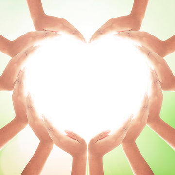 World Environment Day Concept: People Hands In Shape Of Heart On Blurred Green Nature Background