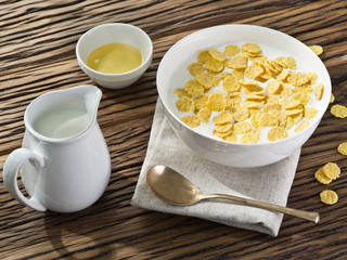 Cornflakes cereal and milk.
