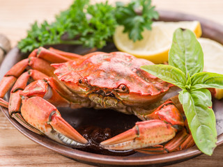 Cooked crab with lemon and herbs.