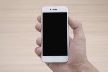 Hand holding a smart phone