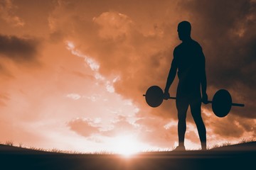Composite image of bodybuilder lifting heavy barbell weights