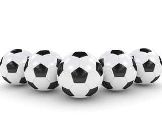 3d rendered soccer balls isolated over white