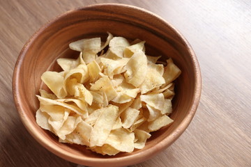 Dried bananas, sugar-coated,in wooden bowl