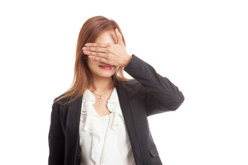 Young Asian business woman close her eyes with hand