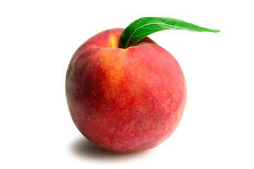 delicious and juicy peach with leaf on white isolated background