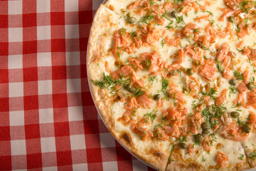 delicious seafood pizza with salmon fish
