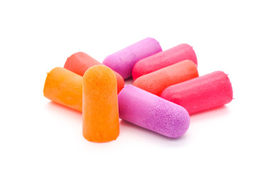 close-up ear plugs stoppers for protection against noise , isolated on a white background