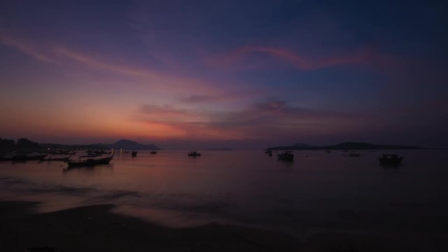 4K VDO Golden Hour Sunrise over sea and on the beach at Phuket Island, Thailand