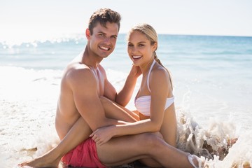 Fototapeta premium Couple having fun on beach