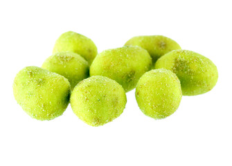 Wasabi coated peanuts on white background