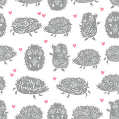 Seamless pattern with decorative hedgehogs. Cute kids background.